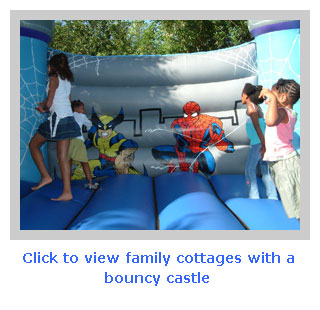 family holiday cottages with a bouncy castle