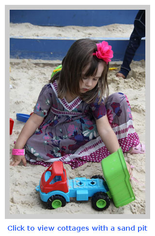 self catering cottages with a sand pit